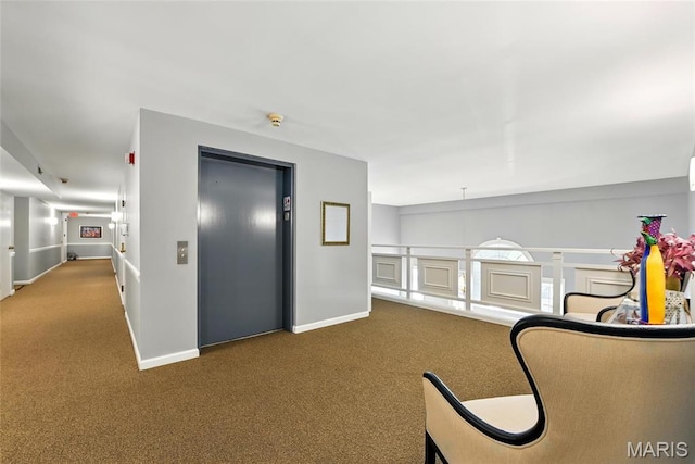 526 Sarah Ln Unit 27, Saint Louis, MO 63141 - living area featuring elevator, carpet floors, and baseboards