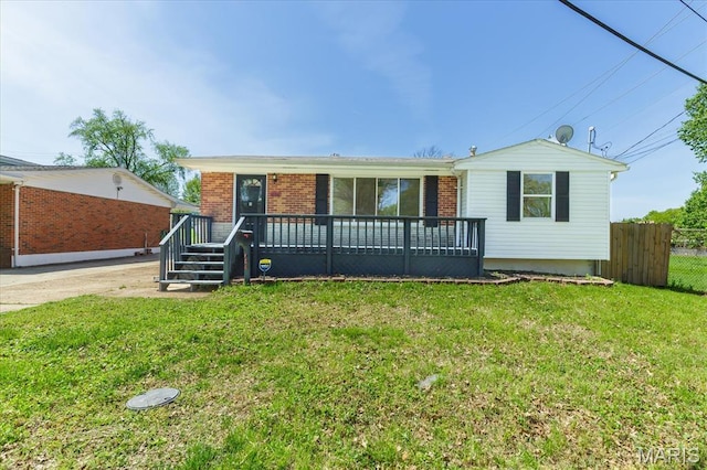 656 Beatrice Ave, Saint Louis, MO 63125 - ranch-style home featuring brick siding and a wooden deck