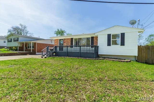 656 Beatrice Ave, Saint Louis, MO 63125 - view of front of property with brick siding and a wooden deck