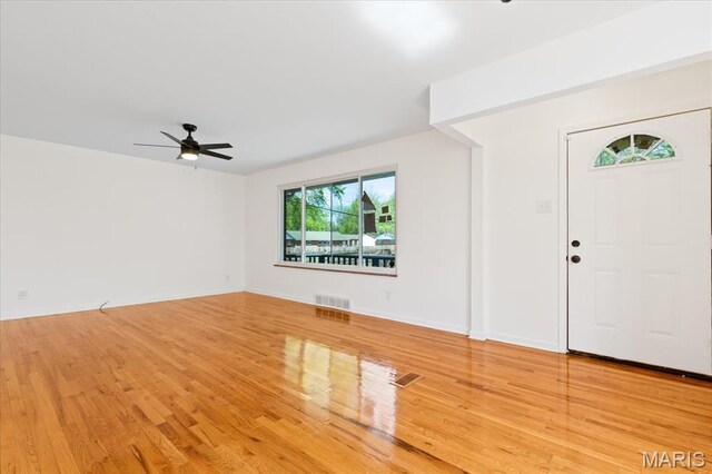 656 Beatrice Ave, Saint Louis, MO 63125 - foyer with wood finished floors, a ceiling fan, and baseboards