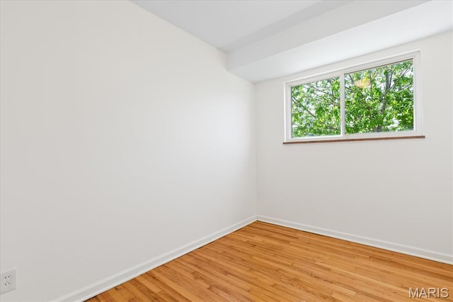 656 Beatrice Ave, Saint Louis, MO 63125 - spare room featuring baseboards and light wood finished floors