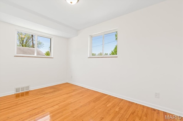 656 Beatrice Ave, Saint Louis, MO 63125 - unfurnished room with baseboards and light wood-style floors