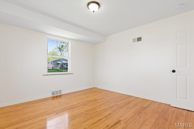 656 Beatrice Ave, Saint Louis, MO 63125 - unfurnished room with light wood-style flooring and baseboards