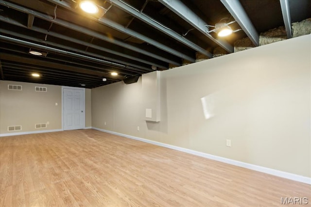 656 Beatrice Ave, Saint Louis, MO 63125 - finished basement with wood finished floors and baseboards