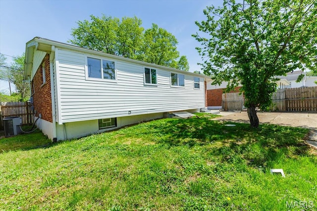 656 Beatrice Ave, Saint Louis, MO 63125 - back of property featuring central AC unit