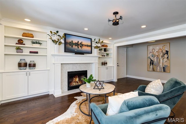 122 N Central Ave Unit A, Saint Louis, MO 63105 - living area with ornamental molding, dark wood finished floors, a high end fireplace, baseboards, and recessed lighting