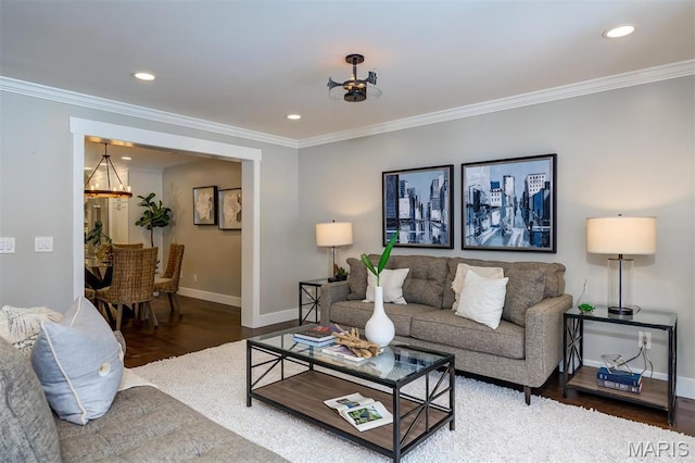 122 N Central Ave Unit A, Saint Louis, MO 63105 - living area featuring a chandelier, wood finished floors, baseboards, crown molding, and recessed lighting