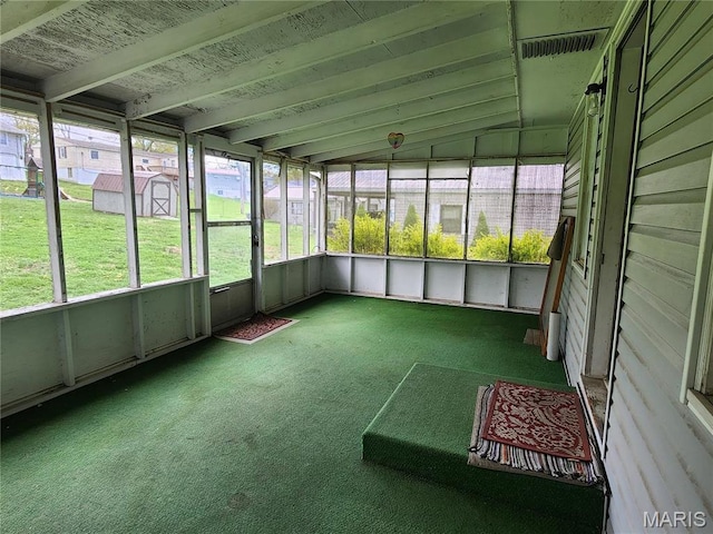 4028 Mcmasters Ave, Hannibal, MO 63401 - unfurnished sunroom featuring healthy amount of natural light and vaulted ceiling