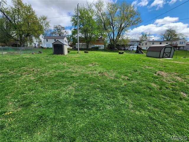 4028 Mcmasters Ave, Hannibal, MO 63401 - view of yard featuring a storage shed and an outdoor structure