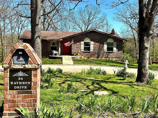 34 Kathryn Dr, St James, MO 65559 - ranch-style home featuring brick siding, a chimney, and a front lawn