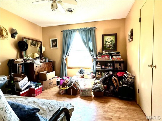 34 Kathryn Dr, St James, MO 65559 - bedroom featuring wood finished floors and a ceiling fan