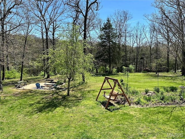 34 Kathryn Dr, St James, MO 65559 - surrounding community featuring a yard and a view of trees