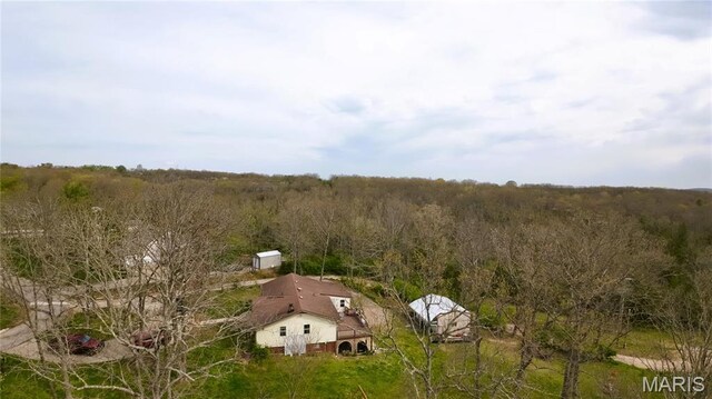 34 Kathryn Dr, St James, MO 65559 - view of subject property featuring a heavily wooded area