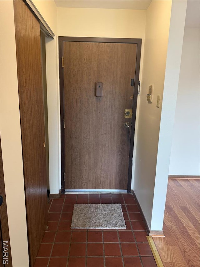 1530 Springlet Ct Unit 32, Florissant, MO 63033 - entryway featuring tile patterned flooring and baseboards