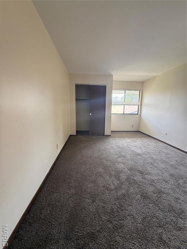 1530 Springlet Ct Unit 32, Florissant, MO 63033 - unfurnished room with carpet floors and baseboards