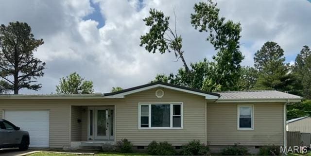 811 Moore St, Dexter, MO 63841 - ranch-style home with crawl space, an attached garage, and metal roof