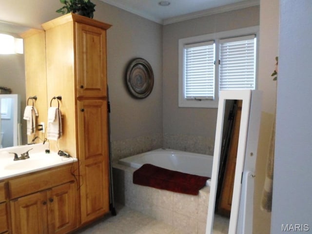3001 Charlton Ln, Poplar Bluff, MO 63901 - bathroom with a garden tub, vanity, and ornamental molding