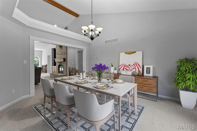 220 Cuivre Point Ln, Moscow Mills, MO 63362 - dining space featuring a chandelier, beamed ceiling, light carpet, baseboards, and high vaulted ceiling