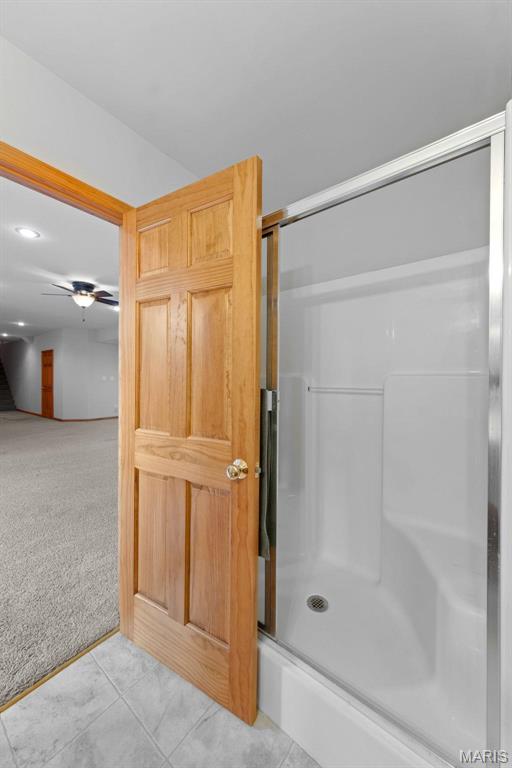 220 Cuivre Point Ln, Moscow Mills, MO 63362 - full bathroom featuring a stall shower, ceiling fan, and recessed lighting