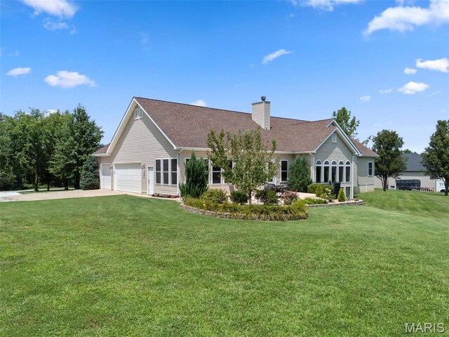 220 Cuivre Point Ln, Moscow Mills, MO 63362 - view of front of property with a garage, a front yard, driveway, and a chimney