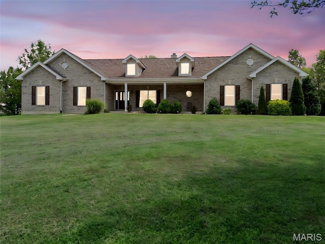 220 Cuivre Point Ln, Moscow Mills, MO 63362 - ranch-style house with brick siding, a lawn, covered porch, and a chimney