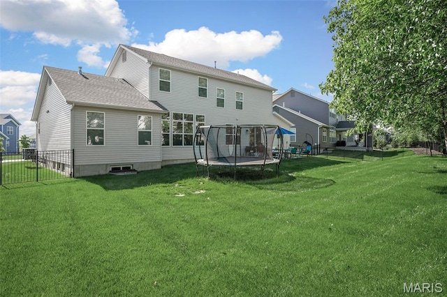 207 Castle Stuart Ct, Dardenne Prairie, MO 63368 - back of house with a trampoline and roof with shingles