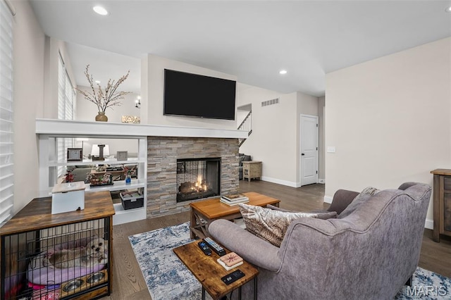 207 Castle Stuart Ct, Dardenne Prairie, MO 63368 - living room featuring a fireplace, wood finished floors, recessed lighting, and baseboards