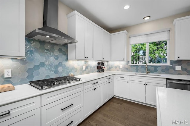 207 Castle Stuart Ct, Dardenne Prairie, MO 63368 - kitchen with wall chimney exhaust hood, a sink, appliances with stainless steel finishes, light countertops, and recessed lighting