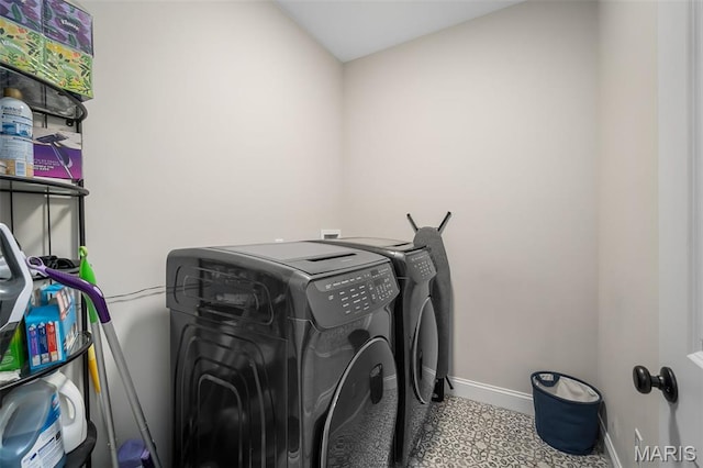 207 Castle Stuart Ct, Dardenne Prairie, MO 63368 - washroom featuring washing machine and clothes dryer and baseboards