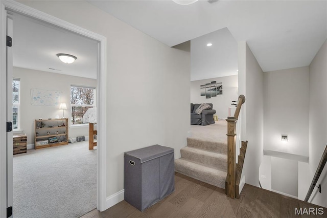 207 Castle Stuart Ct, Dardenne Prairie, MO 63368 - staircase featuring wood finished floors, baseboards, and carpet