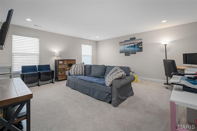 207 Castle Stuart Ct, Dardenne Prairie, MO 63368 - living room featuring light colored carpet, recessed lighting, and baseboards