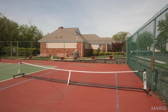 1340 Holgate Dr Unit F2, Ballwin, MO 63021 - view of tennis court with community basketball court