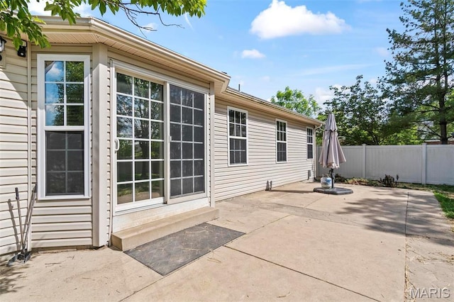 view of patio with fence