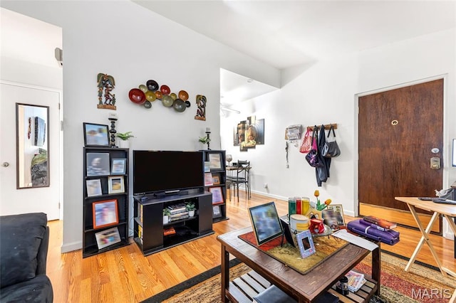 10457 Briarbend Dr Unit 8, Saint Louis, MO 63146 - living area featuring light wood finished floors and baseboards