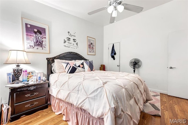 10457 Briarbend Dr Unit 8, Saint Louis, MO 63146 - bedroom with light wood-style floors and ceiling fan