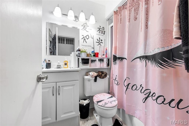 10457 Briarbend Dr Unit 8, Saint Louis, MO 63146 - full bathroom with toilet, vanity, tile patterned floors, and a shower with shower curtain