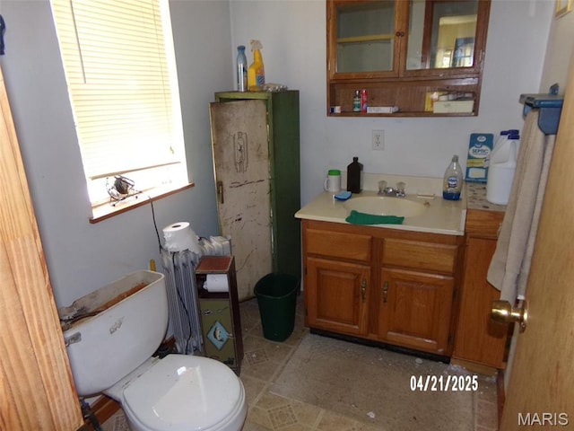 2163 Welch Dr, Hermann, MO 65041 - half bathroom with vanity and toilet