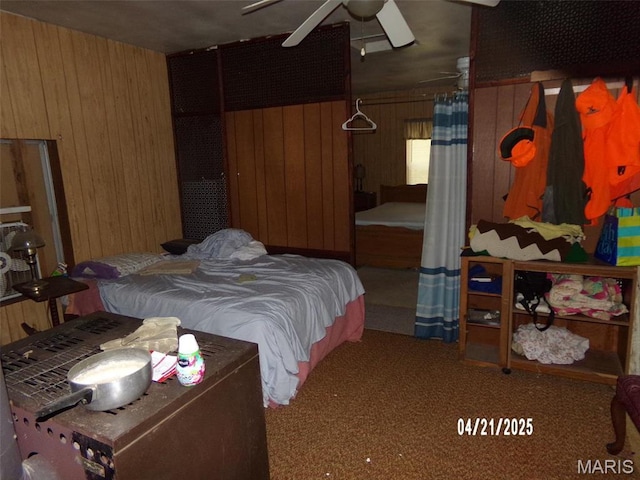 2163 Welch Dr, Hermann, MO 65041 - bedroom with wooden walls and carpet flooring
