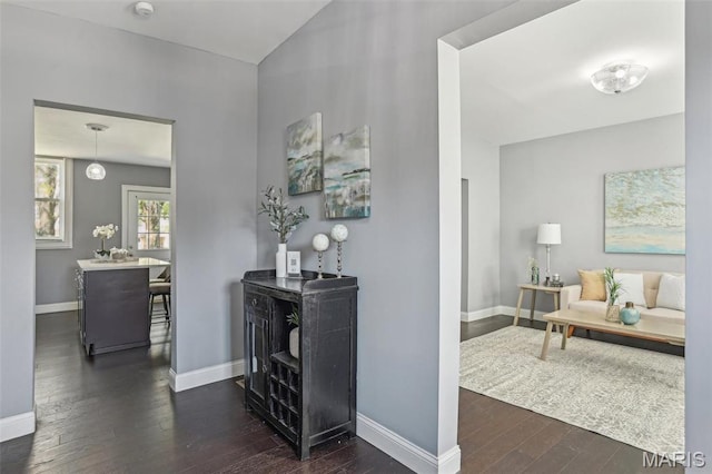 5327 W Ave, Saint Louis, MO 63116 - hall with dark wood finished floors and baseboards