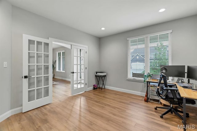 215 Everett Creek Ct, Lake St Louis, MO 63367 - home office featuring french doors, baseboards, wood finished floors, and recessed lighting