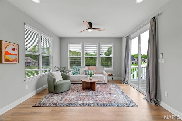 215 Everett Creek Ct, Lake St Louis, MO 63367 - living area with ceiling fan, plenty of natural light, wood finished floors, baseboards, and recessed lighting