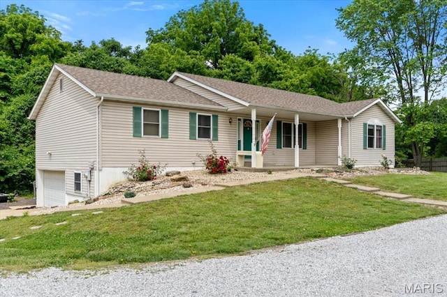 2305 Loretta Ln, Collinsville, IL 62234 - single story home featuring a porch, a garage, a front yard, and roof with shingles