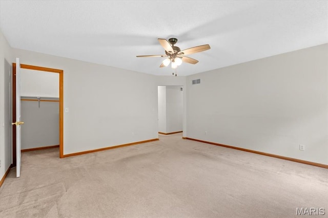 2305 Loretta Ln, Collinsville, IL 62234 - unfurnished bedroom with carpet flooring, baseboards, and a spacious closet