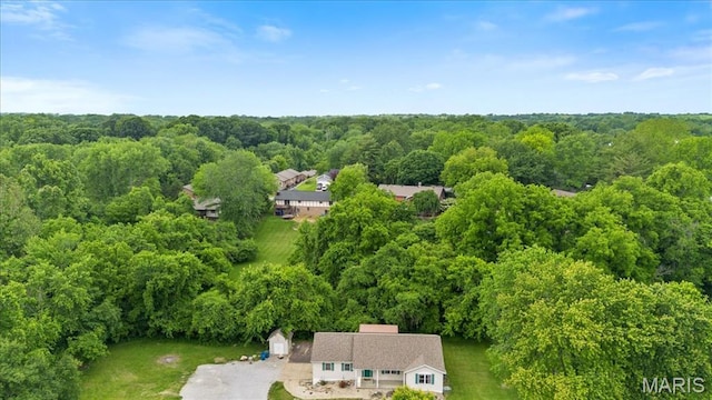 2305 Loretta Ln, Collinsville, IL 62234 - aerial view of property and surrounding area featuring a heavily wooded area