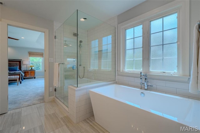 734 Fuhrmann Ter, Glendale, MO 63122 - full bathroom featuring ensuite bathroom, a shower stall, a bathtub, and recessed lighting
