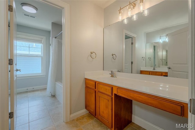 734 Fuhrmann Ter, Glendale, MO 63122 - full bathroom with vanity, tile patterned flooring, baseboards, and shower / bath combo