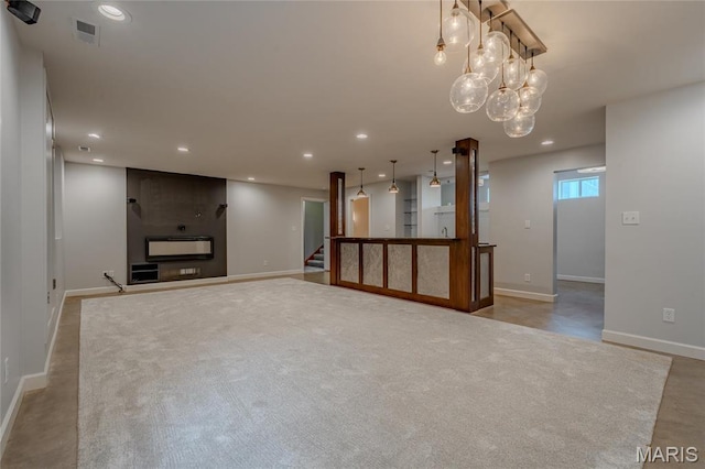 734 Fuhrmann Ter, Glendale, MO 63122 - unfurnished living room with baseboards, stairway, and recessed lighting