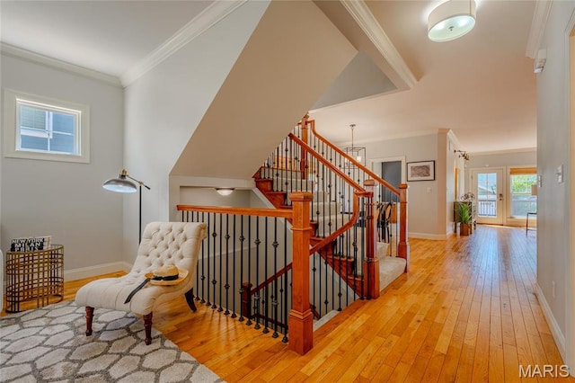 734 Fuhrmann Ter, Glendale, MO 63122 - stairway featuring hardwood / wood-style floors, baseboards, and crown molding