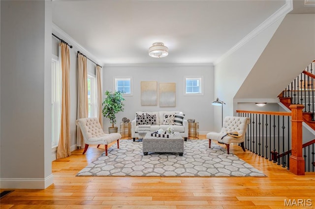 734 Fuhrmann Ter, Glendale, MO 63122 - sitting room with light wood-style floors, ornamental molding, and baseboards