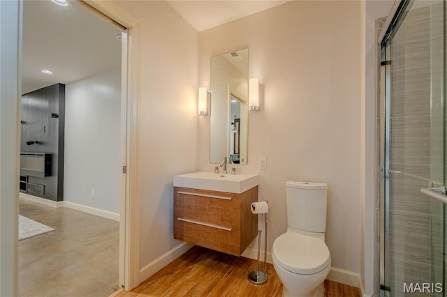734 Fuhrmann Ter, Glendale, MO 63122 - full bath featuring toilet, vanity, baseboards, tiled shower, and recessed lighting